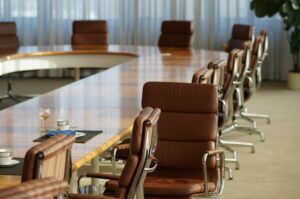 Picture of a boardroom table at a college campus