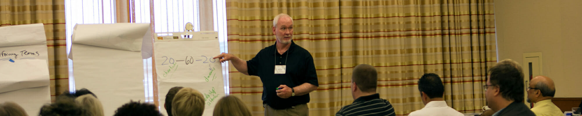 Leadership1 group of learners at an Academic Impressions conference