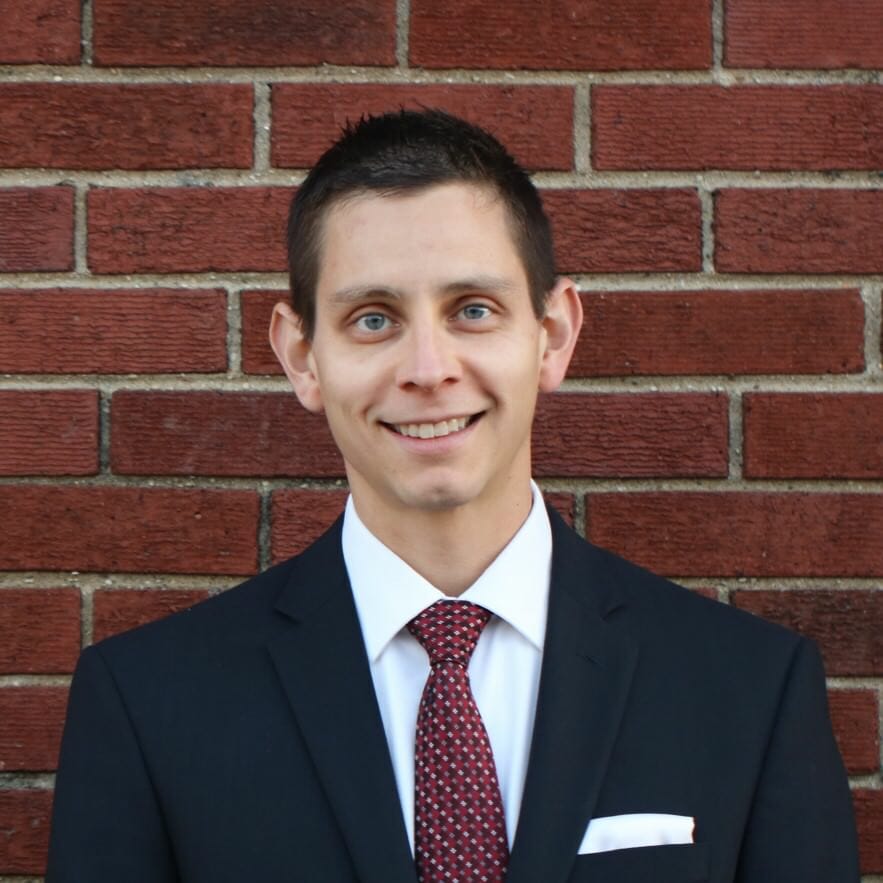 Professional portrait of Reggie Bustinza