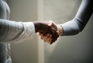 Two people shaking hands