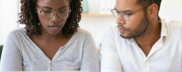 Corporate trainer explaining company project details