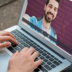 Closeup of woman chatting online with her friend