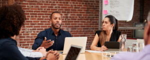 Professionals at a roundtable meeting