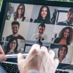 Video call with other professionals on a laptop