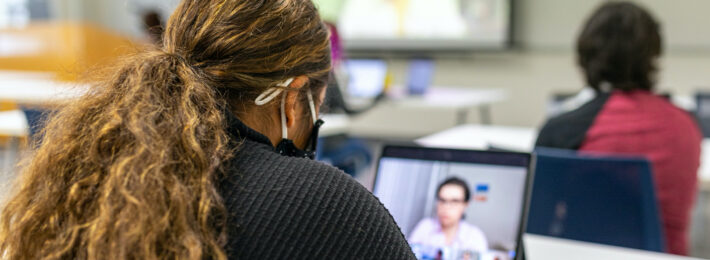 Female student learning online