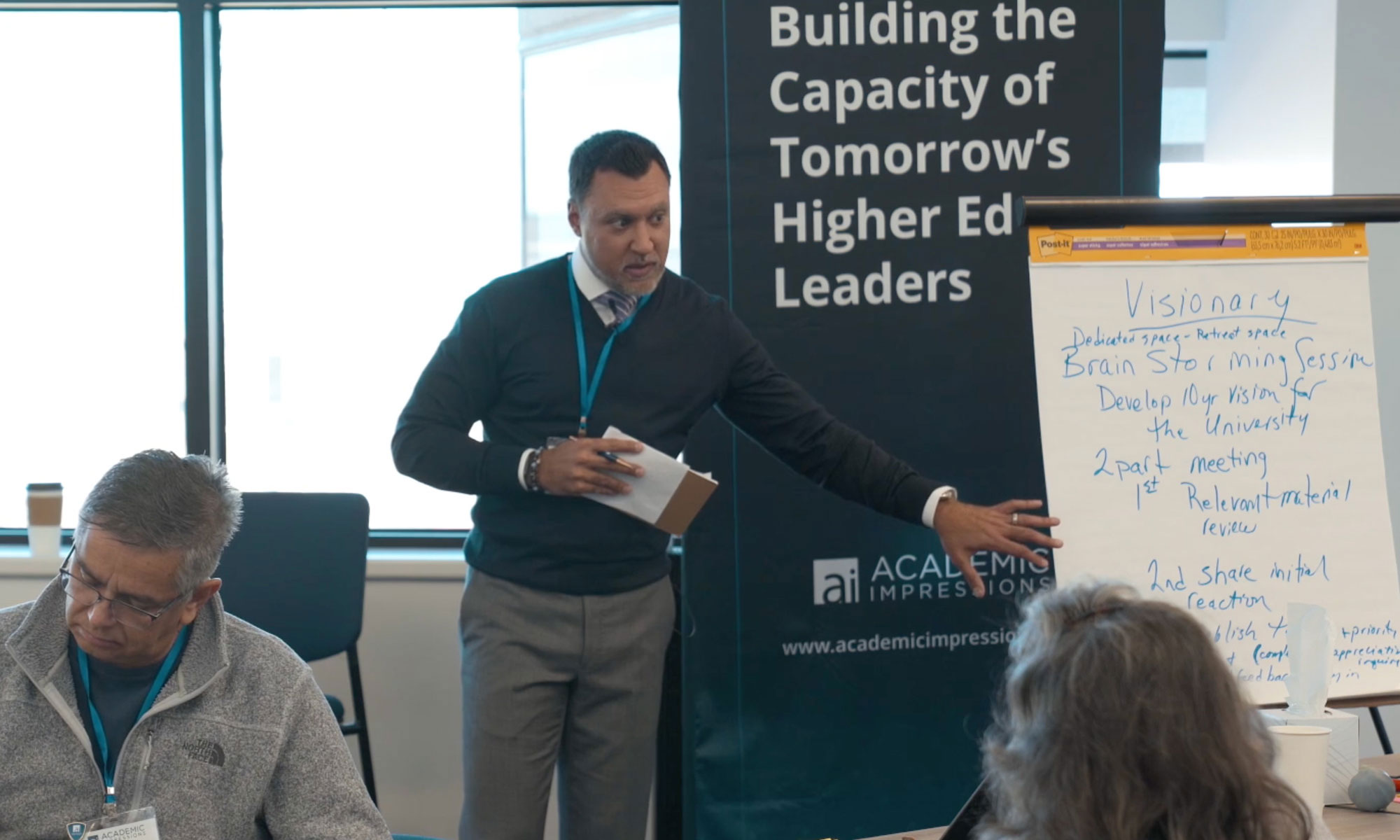 Amit Mrig presenting at an Academic Impressions Workshop